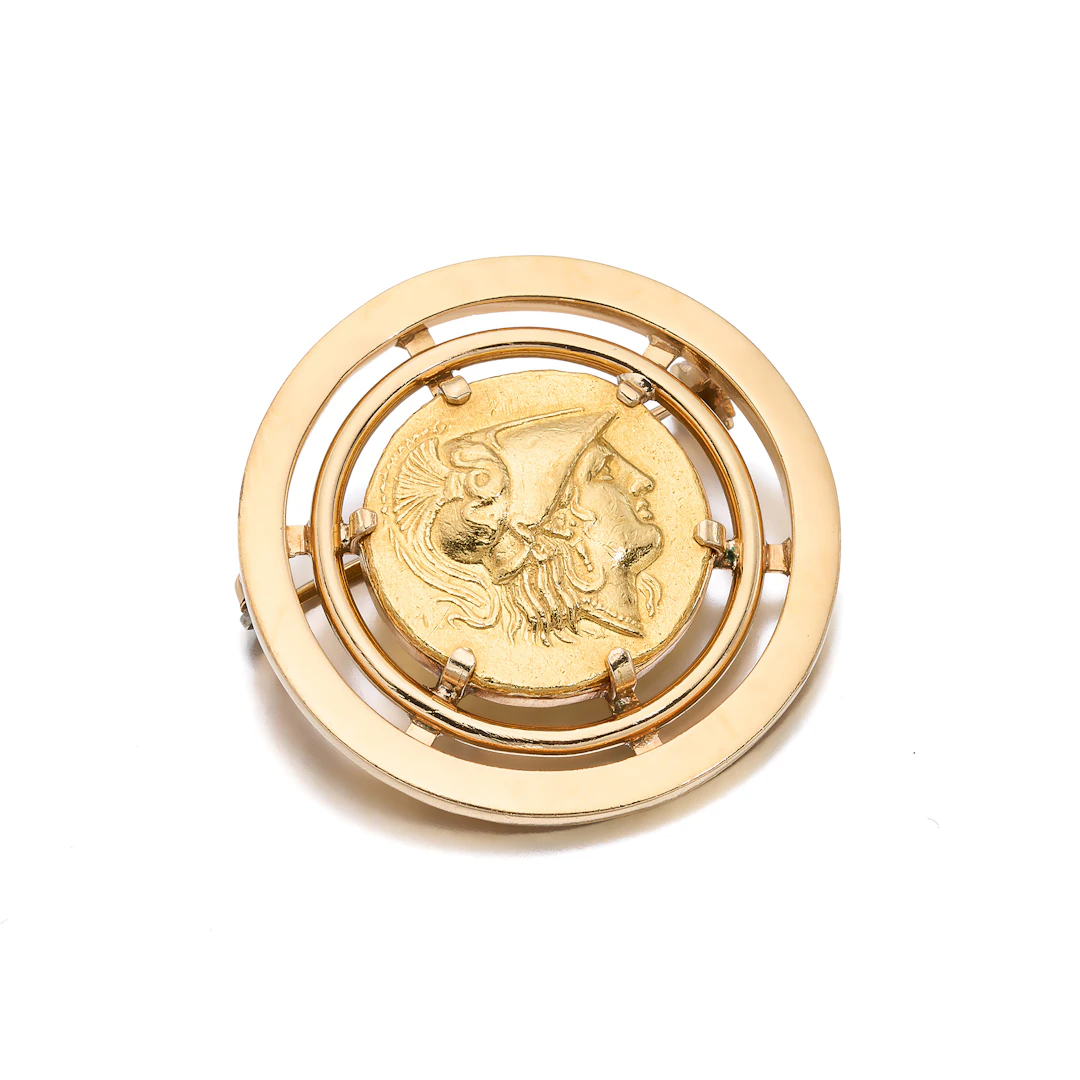 A Gold Coin and Gold Brooch