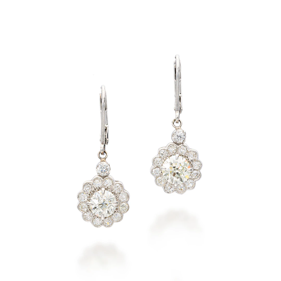 A Pair of Diamond, Platinum and White Gold Ear Pendants