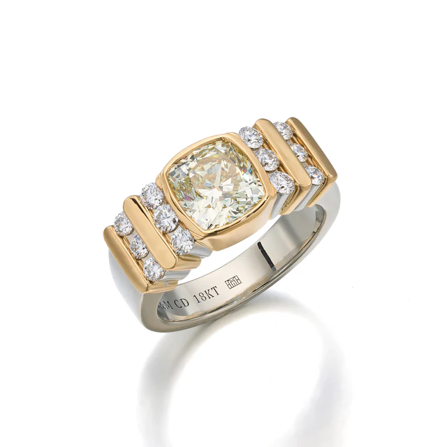A Coloured Diamond and Two-Tone Gold Ring