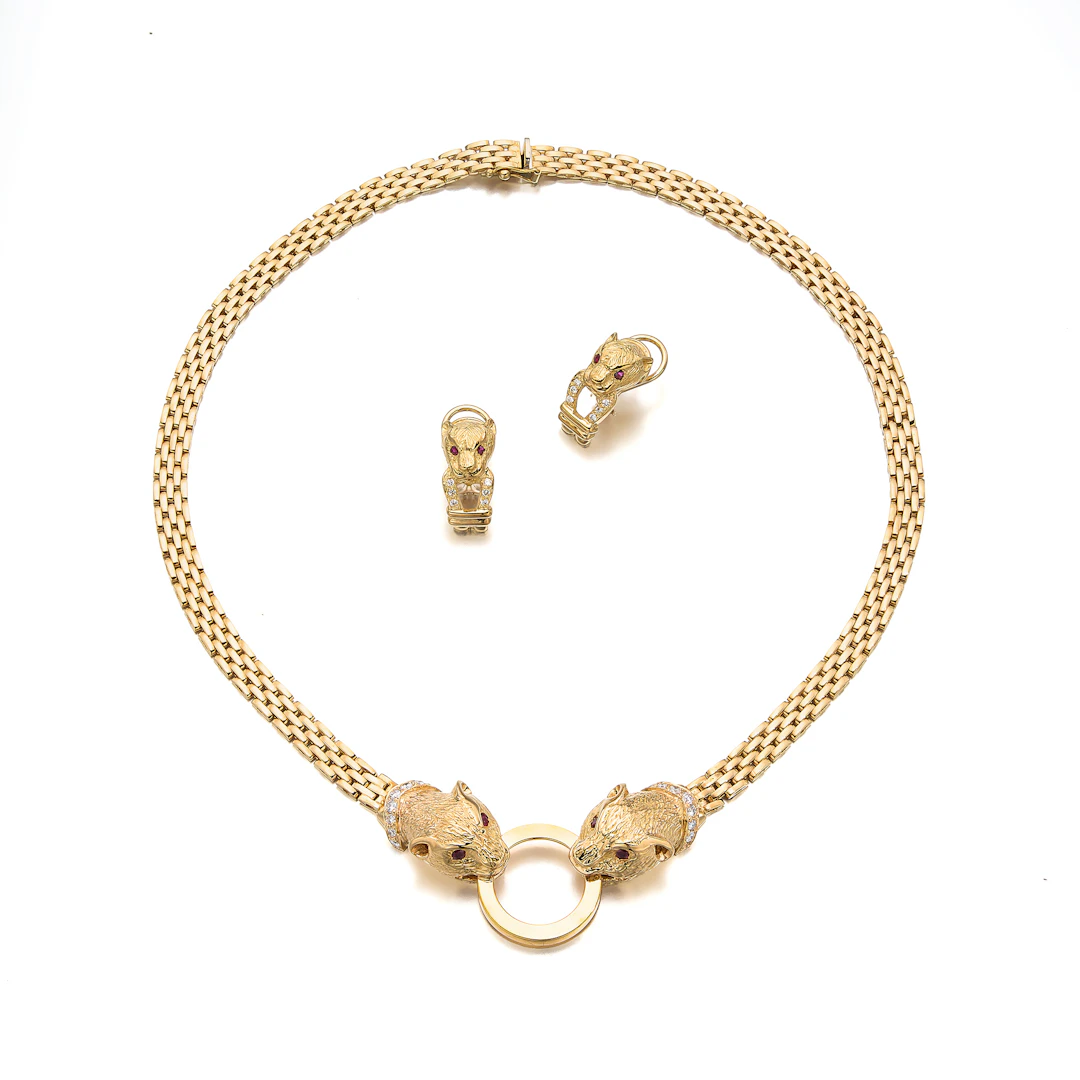 A Diamond, Ruby and Gold Necklace and Ear Clips