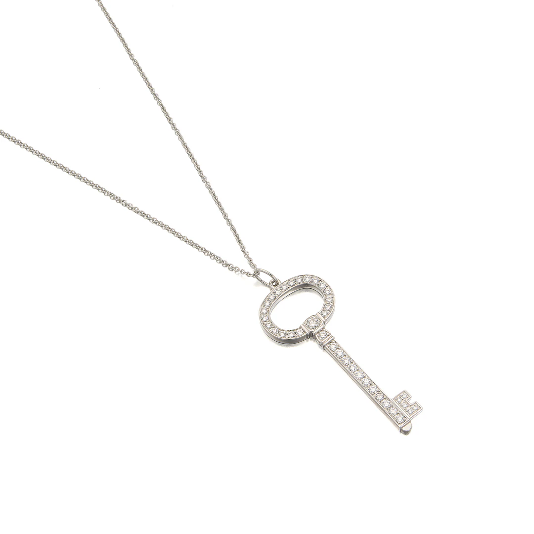 A Diamond and Platinum 'Key' Pendant Necklace, Tiffany & Co.