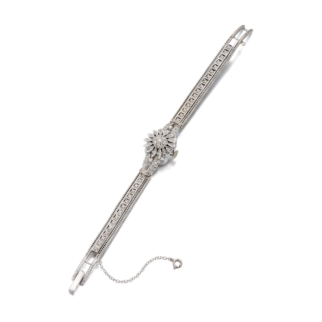 A Lady's Diamond and White Gold Bracelet Watch