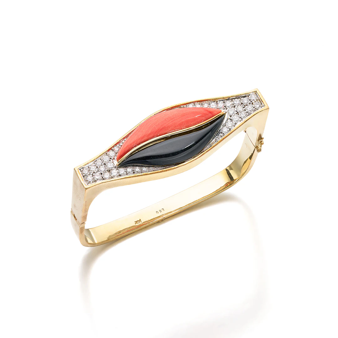 A Coral, Onyx, Diamond and Gold Bangle Bracelet