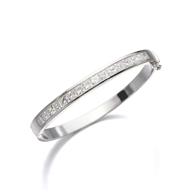 A Diamond and White Gold Bangle Bracelet