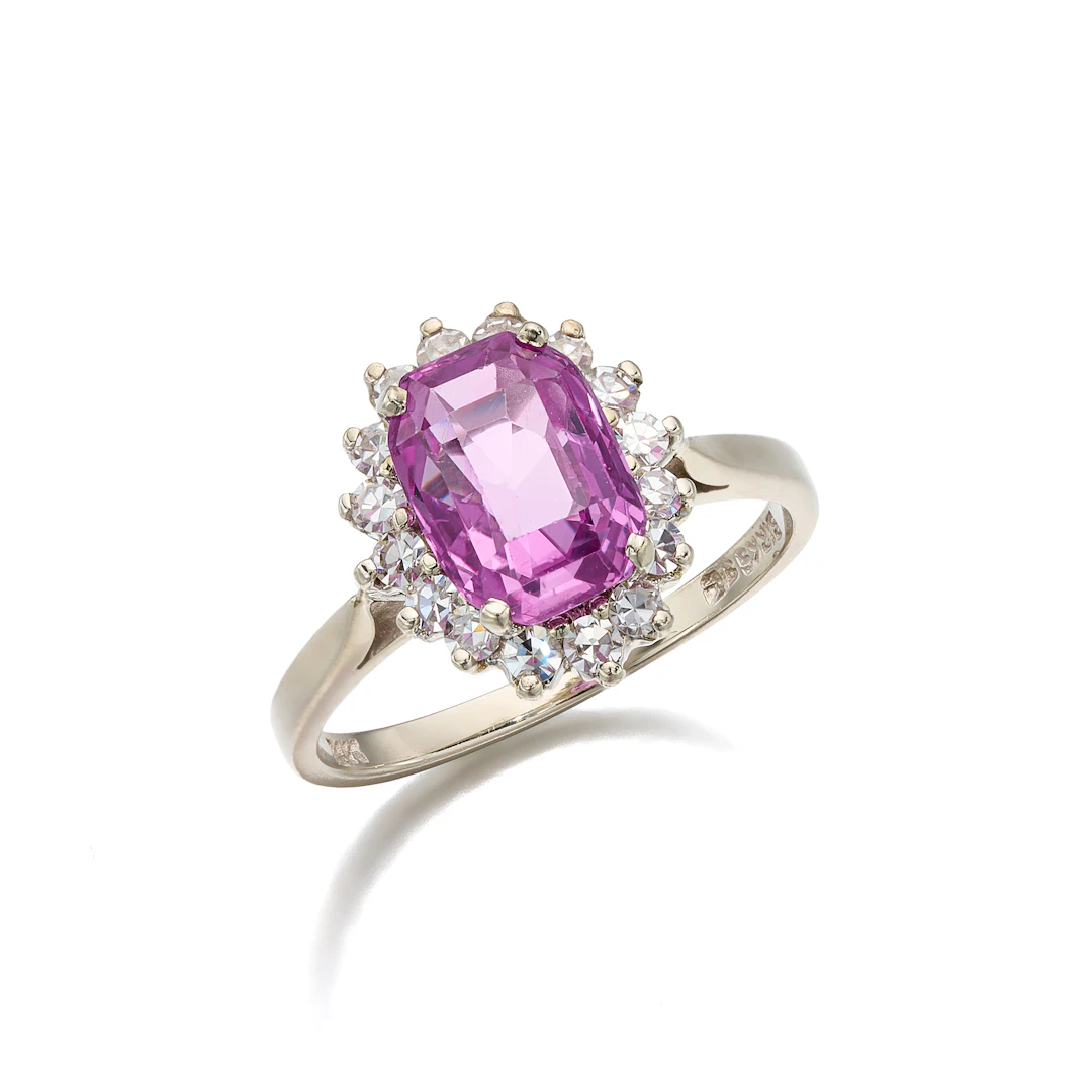 A Pink Sapphire, Diamond and White Gold Ring
