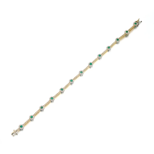 An Emerald, Diamond and Two-Tone Gold Bracelet