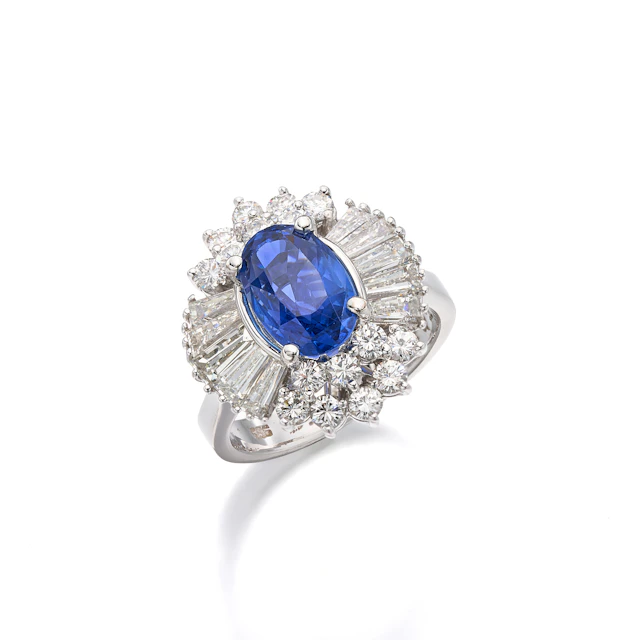 A Sapphire, Diamond and White Gold Ring