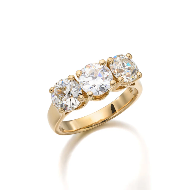 A Three-Stone Diamond and Gold Ring