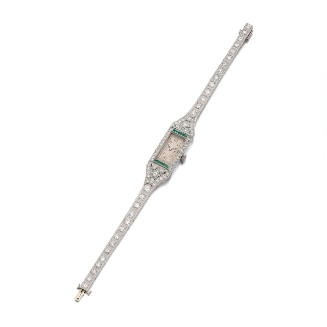 A Lady's Art Deco Emerald, Diamond and Platinum Wristwatch