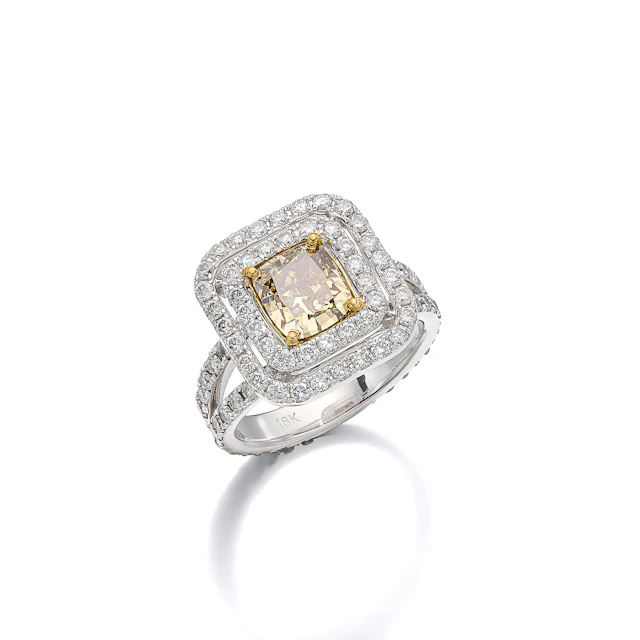 A Coloured Diamond and White Gold Ring