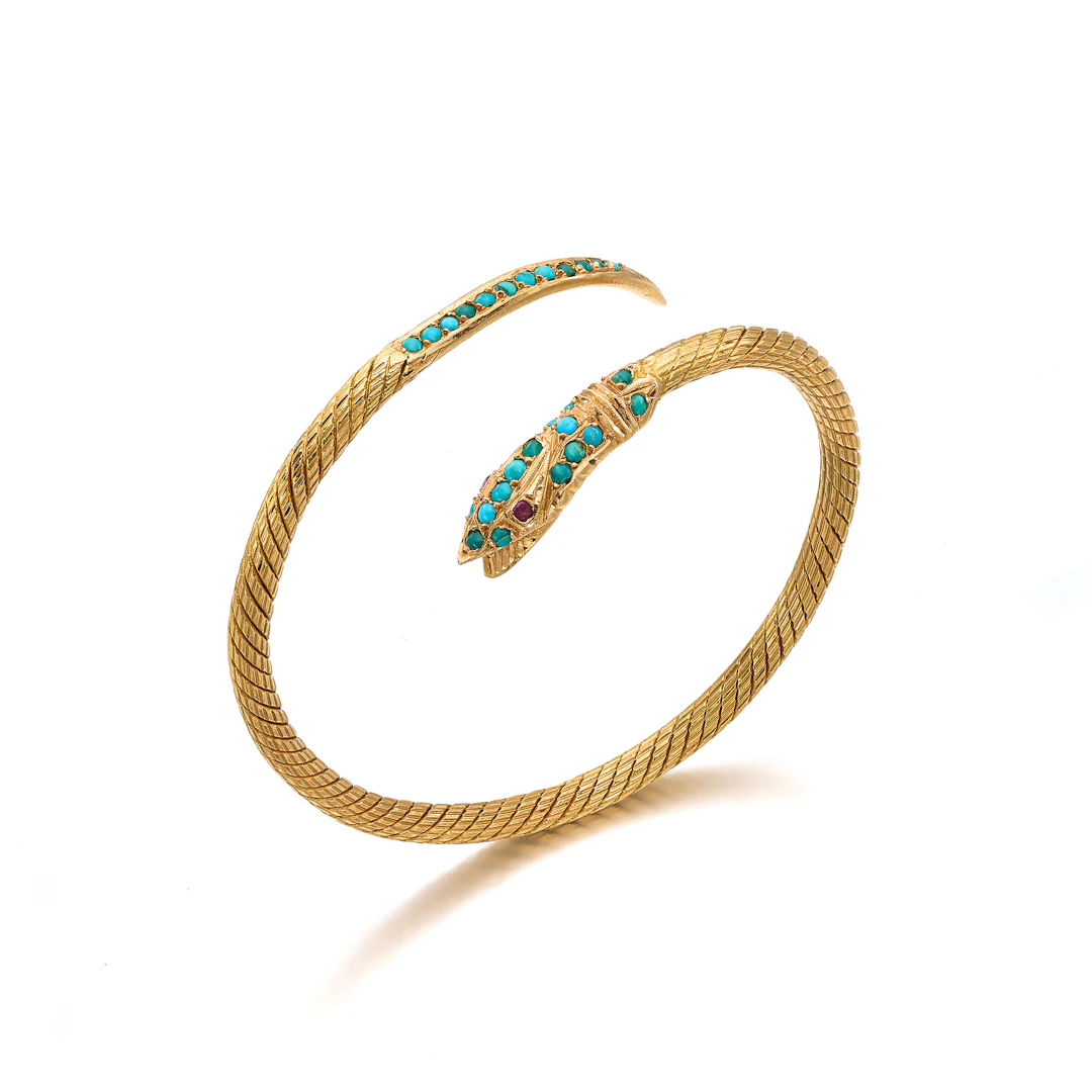 A Turquoise, Ruby and Gold Bangle Bracelet