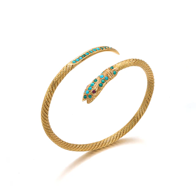 A Turquoise, Ruby and Gold Bangle Bracelet