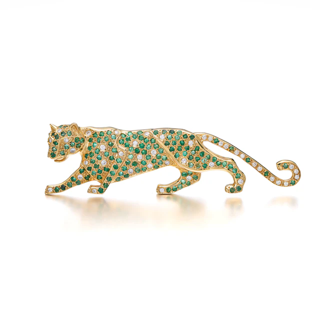 An Emerald, Diamond and Gold Brooch