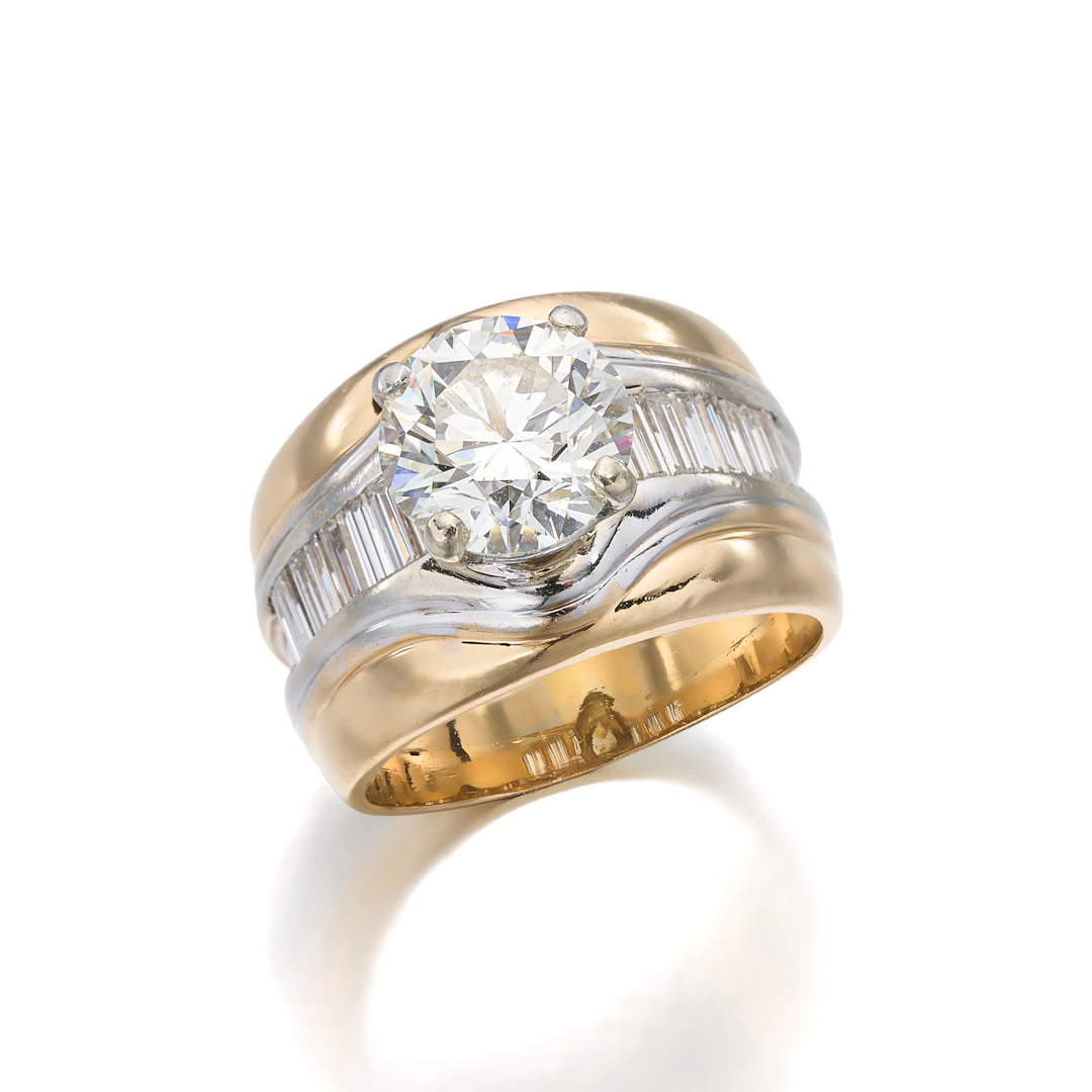 A Diamond and Two-Tone Gold Ring