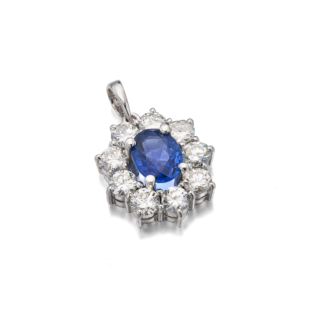 A Sapphire, Diamond and White Gold Pendant