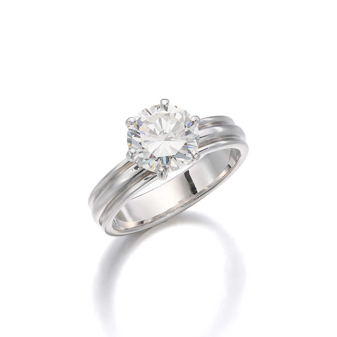 A Diamond Solitaire and White Gold Ring