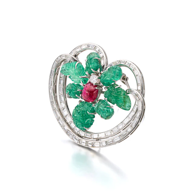 An Emerald, Ruby, Diamond and Platinum Clip Brooch with Chain