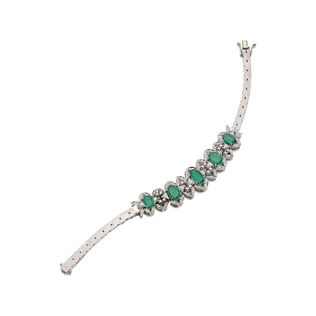 An Emerald, Diamond and White Gold Bracelet