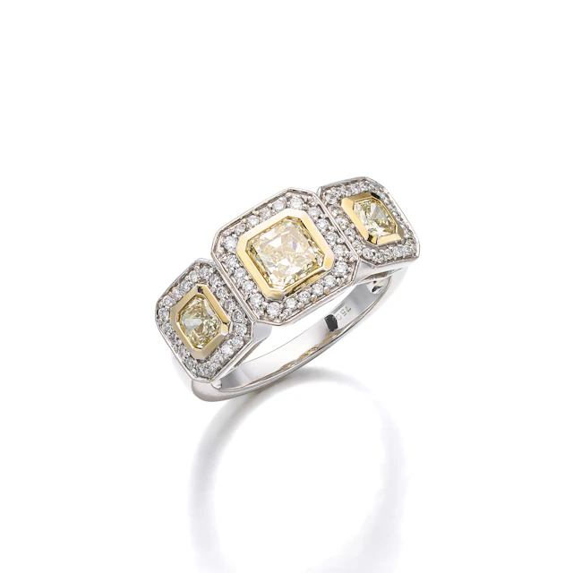 A Coloured Diamond and White Gold Ring