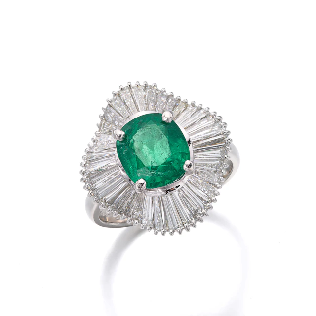 An Emerald, Diamond and White Gold Ballerina Ring