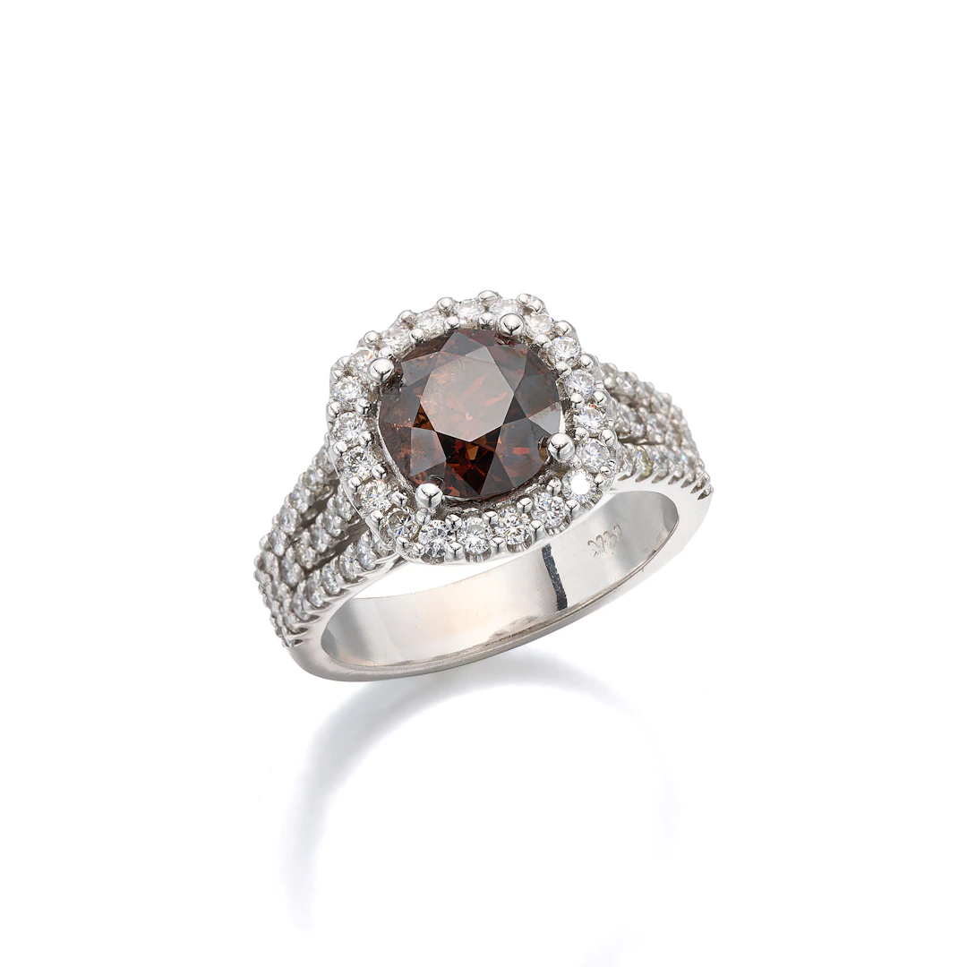 A Coloured Diamond and White Gold Ring