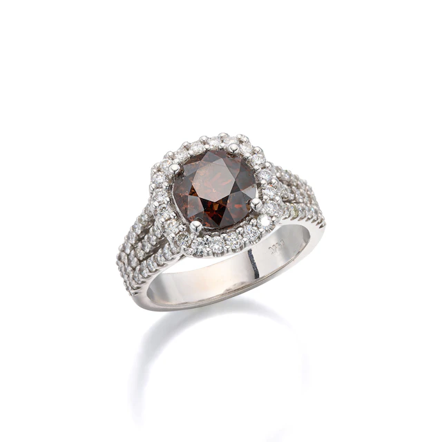 A Coloured Diamond and White Gold Ring