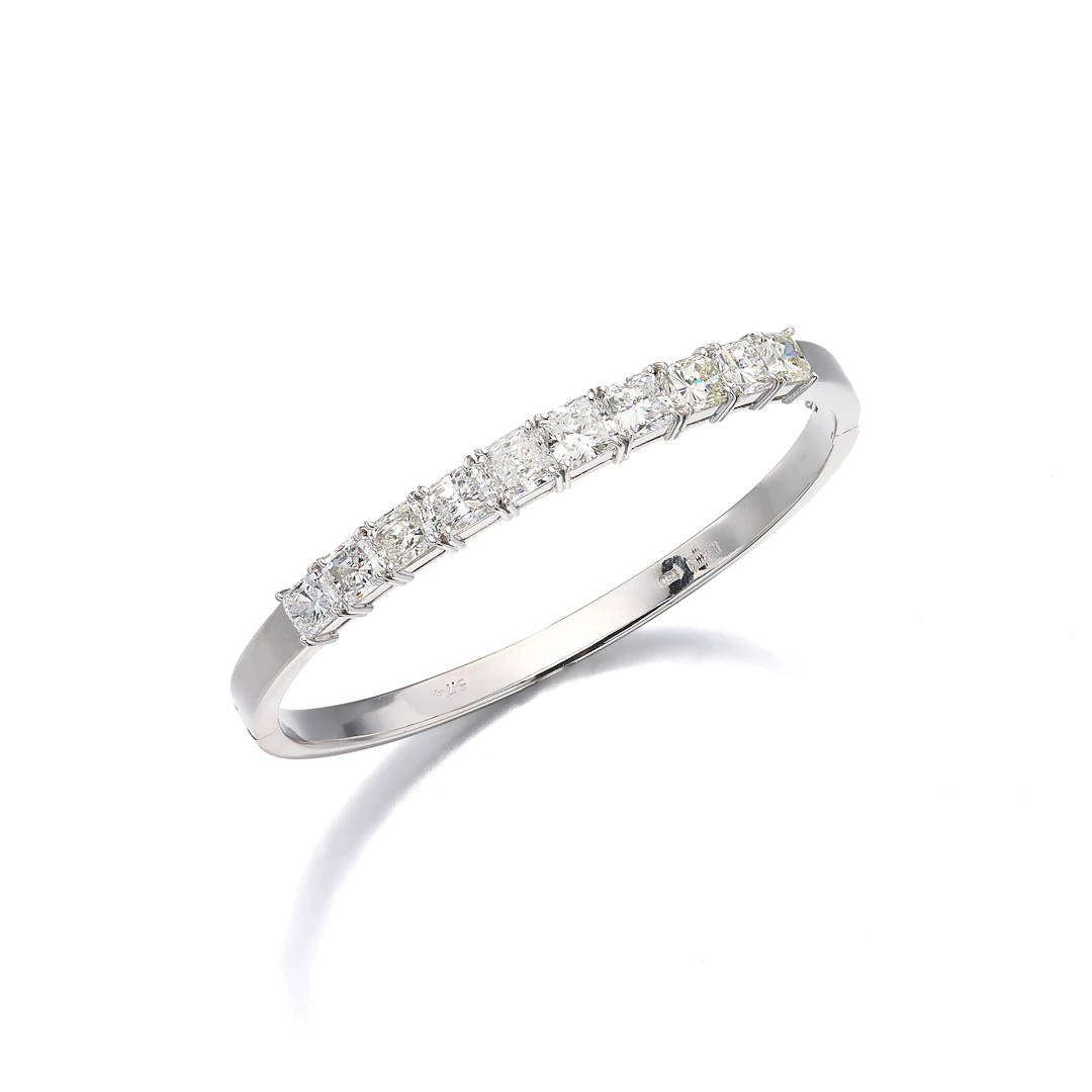 A Diamond and White Gold Bangle Bracelet