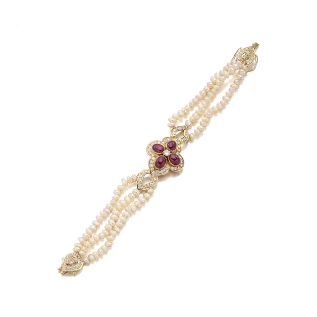 A Cultured Pearl, Ruby, Diamond and Gold Bracelet