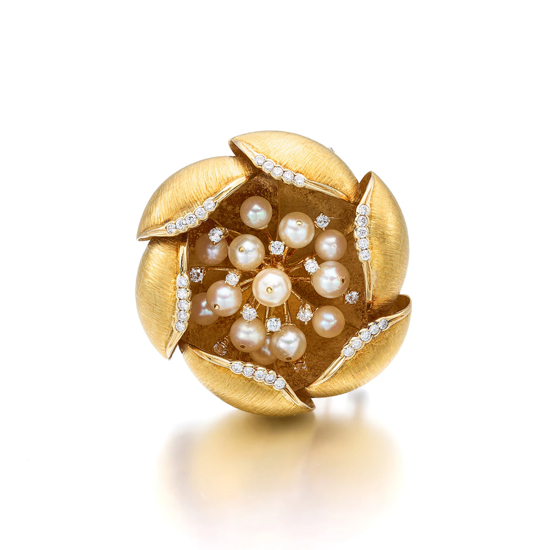 A Cultured Pearl, Diamond and Gold Clip Brooch