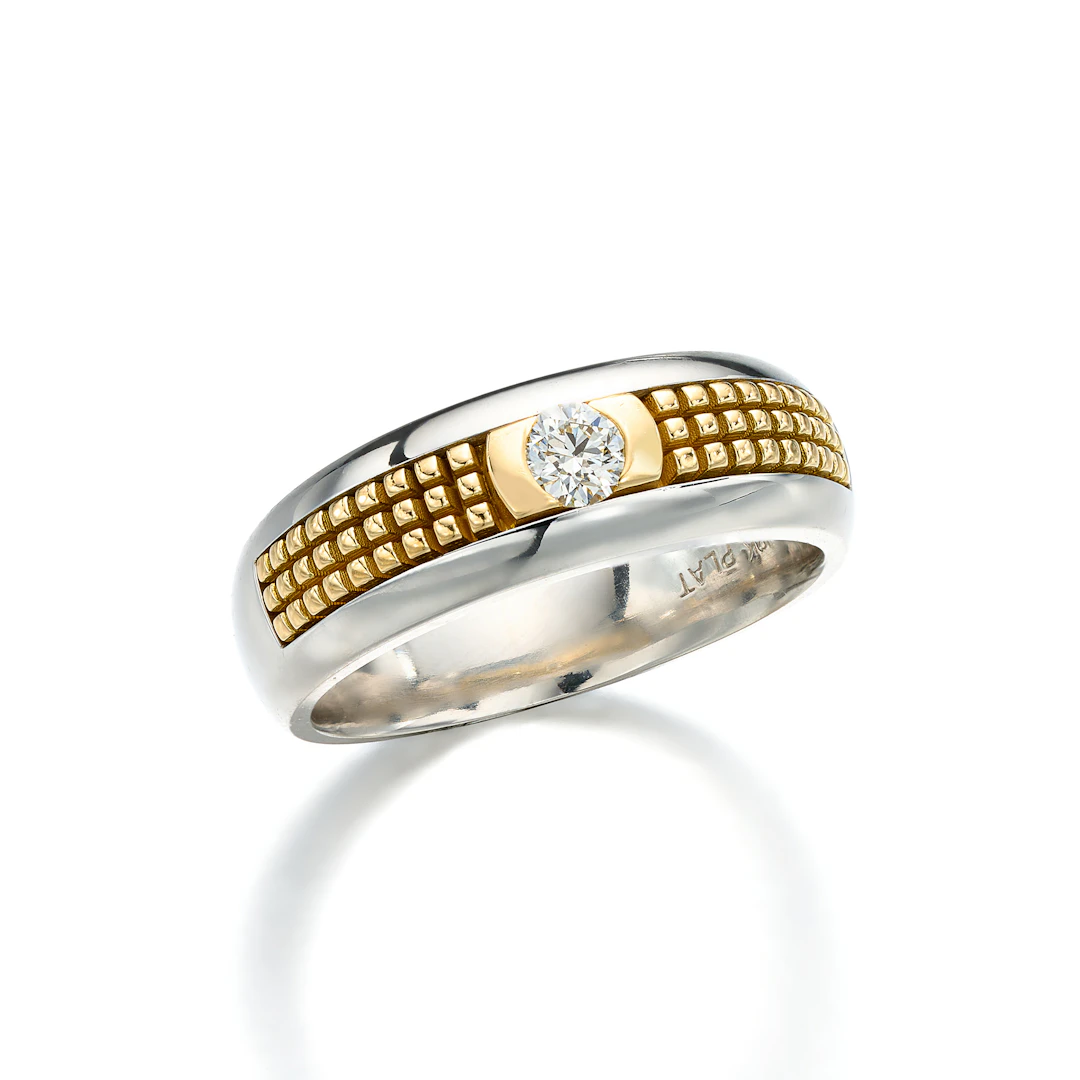 A Diamond, Gold and Platinum Ring