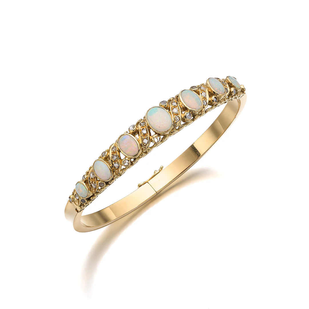 An Opal and Gold Bangle Bracelet