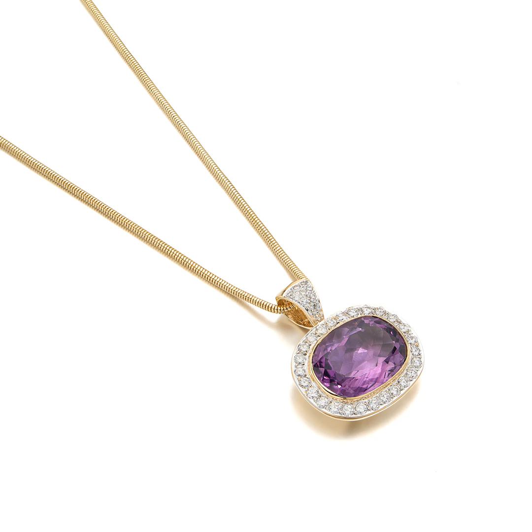 An Amethyst, Diamond and Gold Pendant Necklace