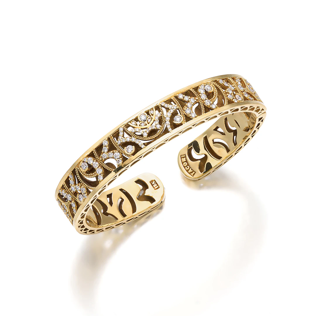 A Diamond and Gold Bangle Bracelet, by Tacori