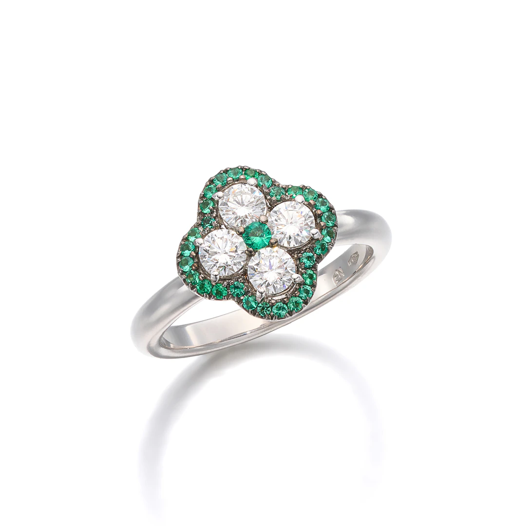 A Diamond, Emerald and White Gold Ring