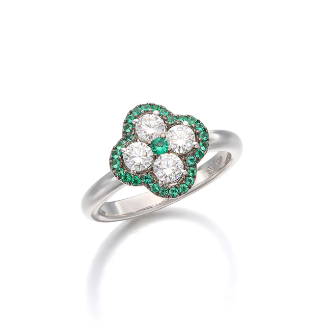 A Diamond, Emerald and White Gold Ring