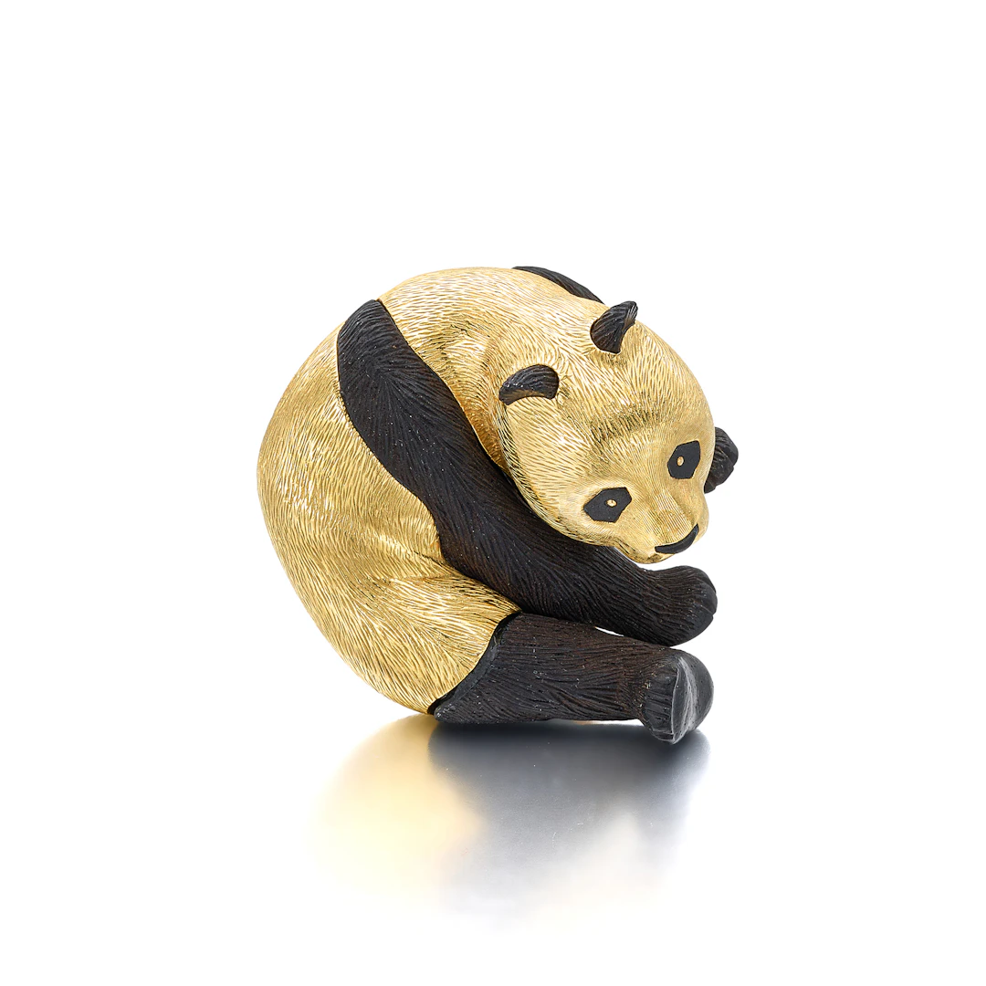 An Onyx and Gold Clip Brooch, by Gallopin