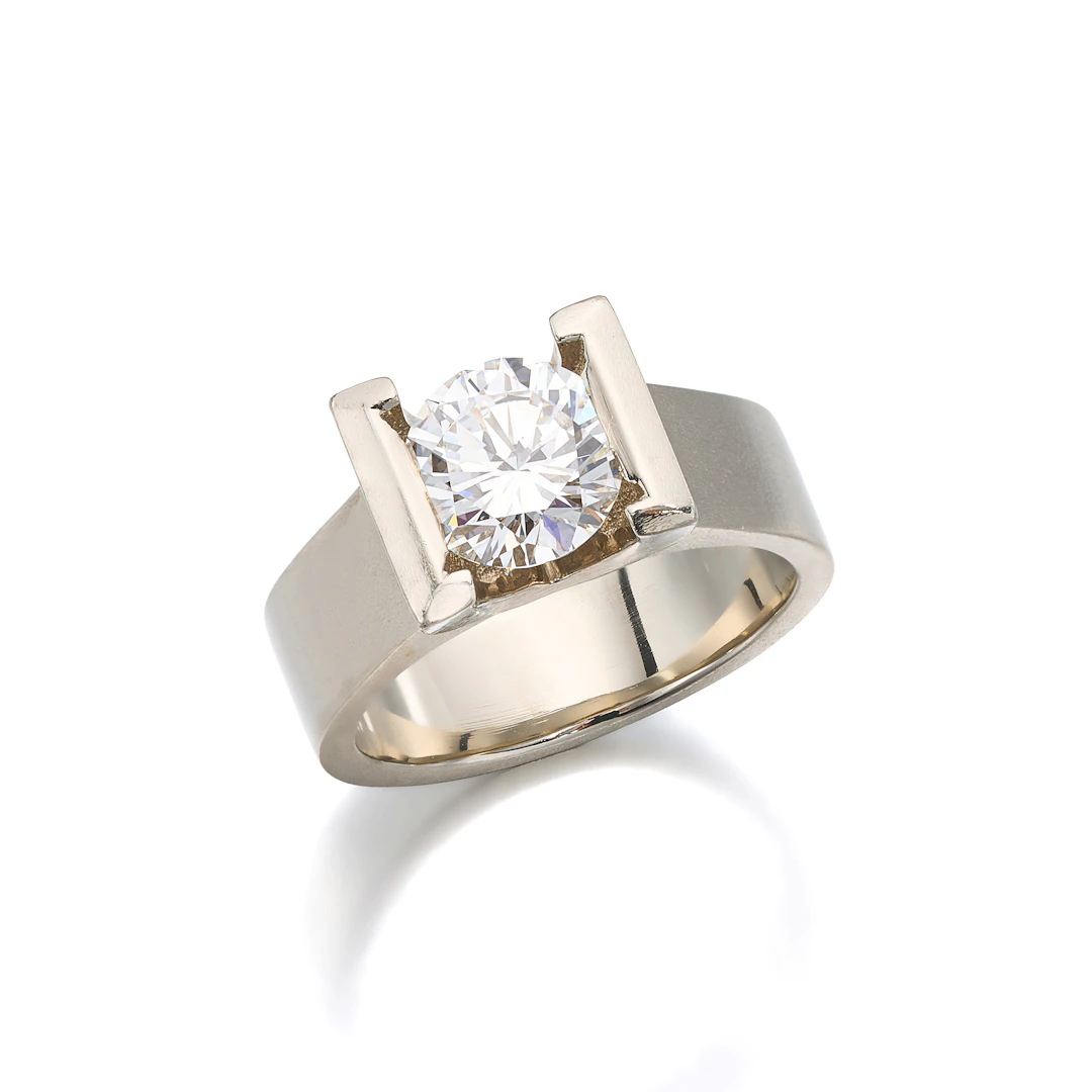 A Diamond Solitaire and White Gold Ring