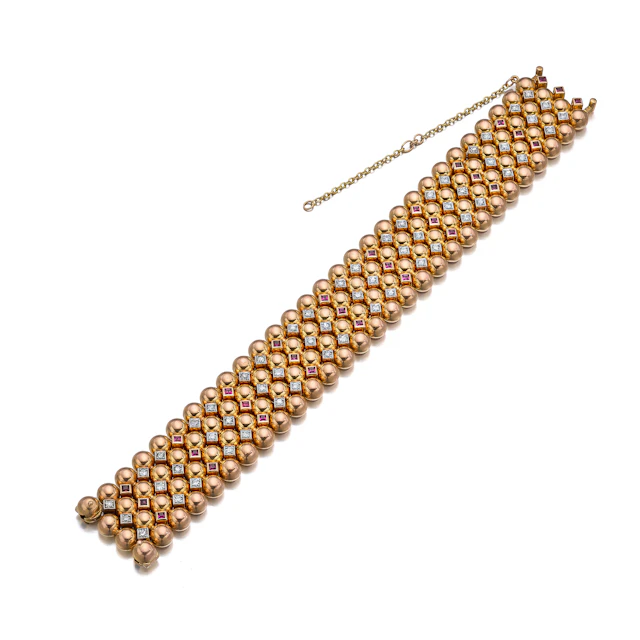 A Retro Diamond, Synthetic Ruby and Rose Gold Bracelet, circa 1950
