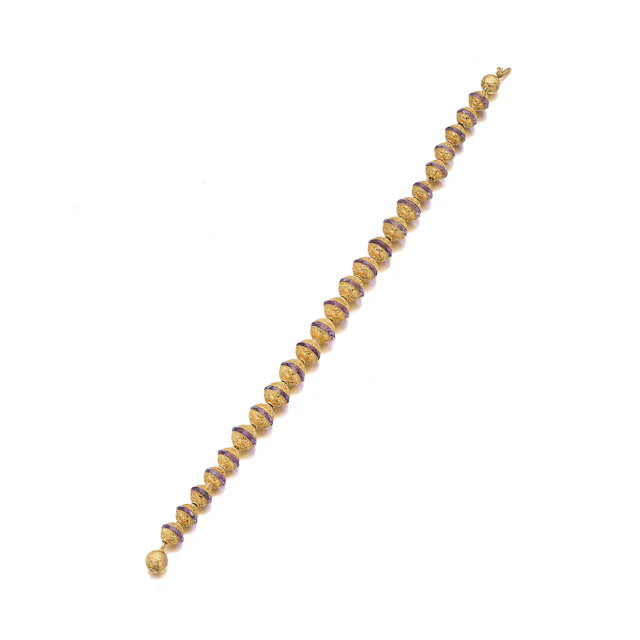 An Amethyst and Gold Bracelet