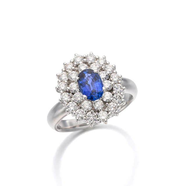 A Sapphire, Diamond and White Gold Ring