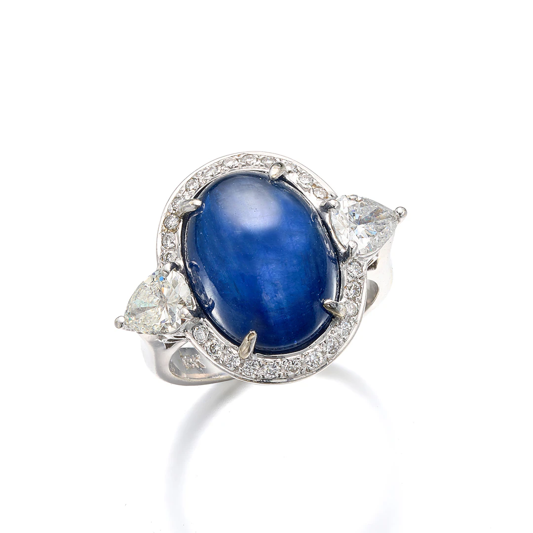 A Sapphire, Diamond and White Gold Ring