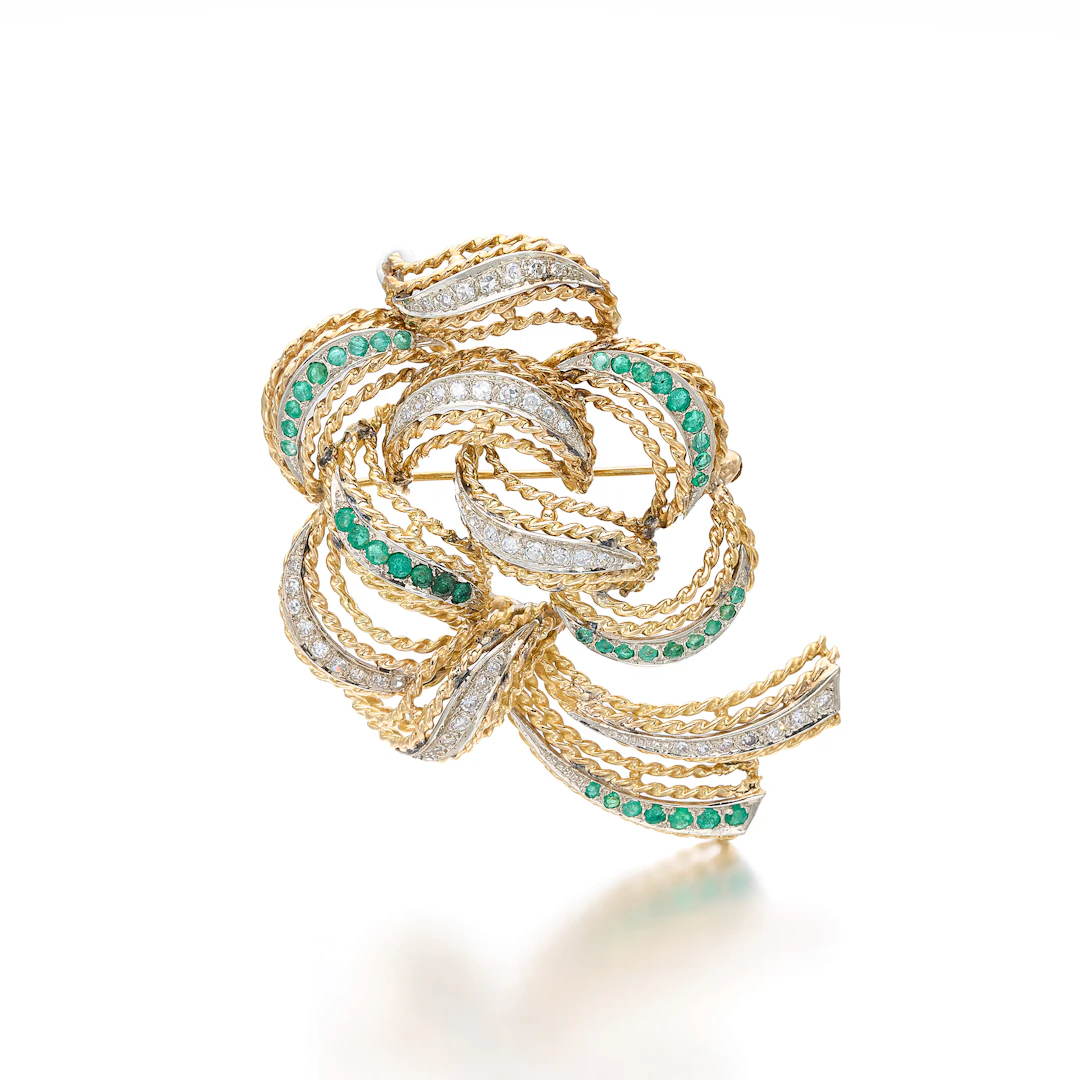 An Emerald, Diamond and Gold Brooch