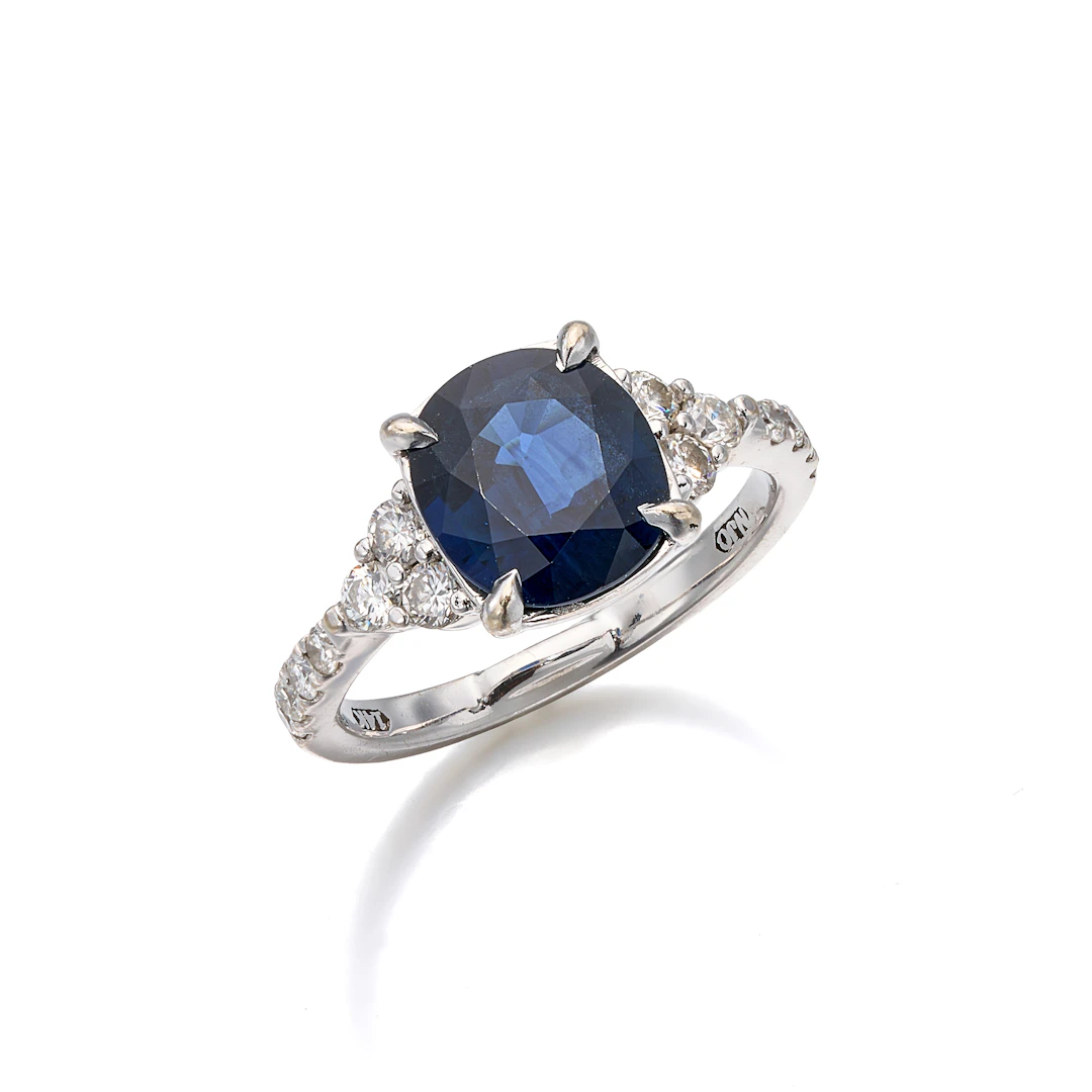 A Sapphire, Diamond and White Gold Ring