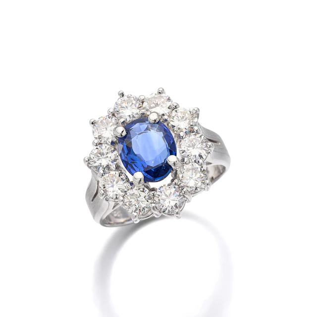 A Sapphire, Diamond and White Gold Ring