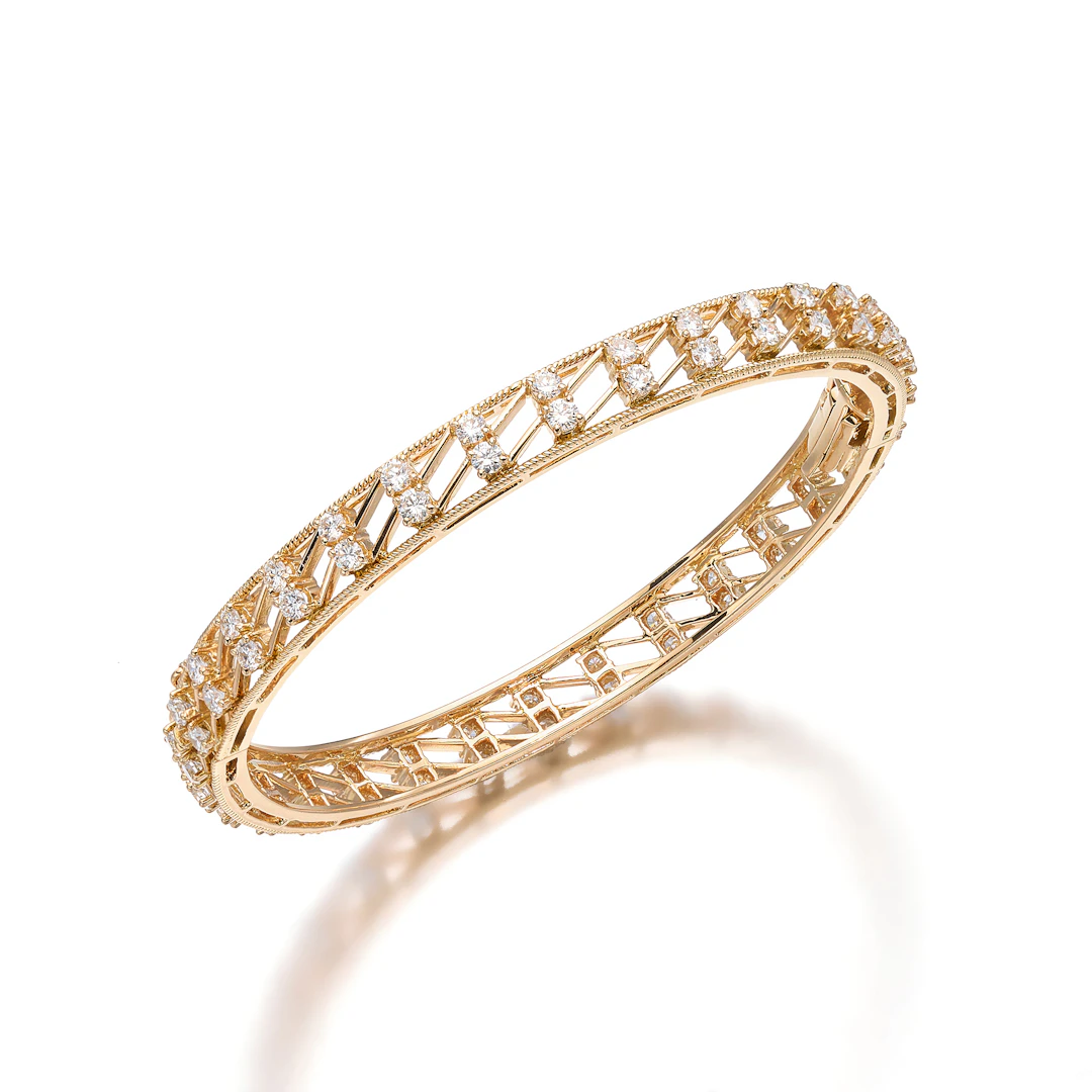 A Diamond and Gold Bangle Bracelet