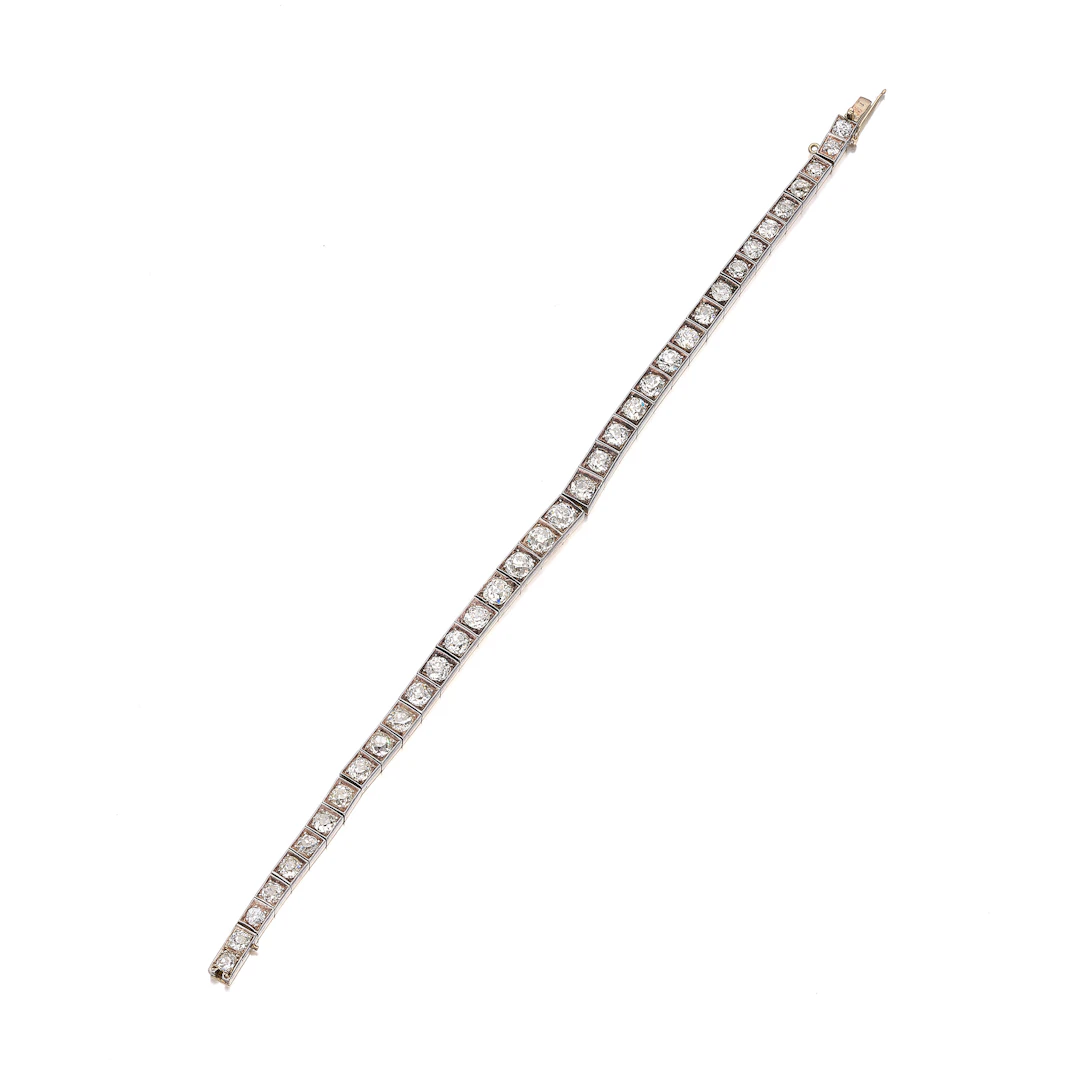An Antique Diamond, Silver and Gold 'Tennis' Line Bracelet