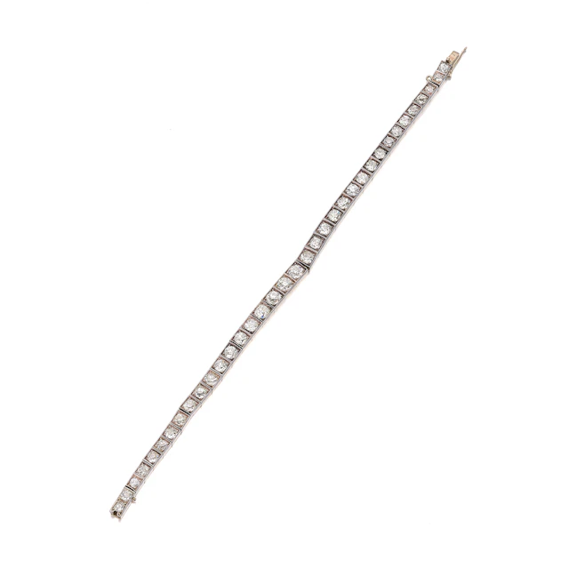 An Antique Diamond, Silver and Gold 'Tennis' Line Bracelet