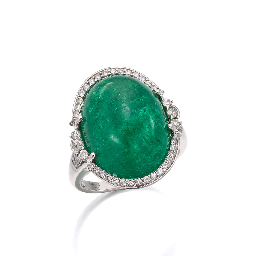 An Emerald, Diamond and White Gold Ring
