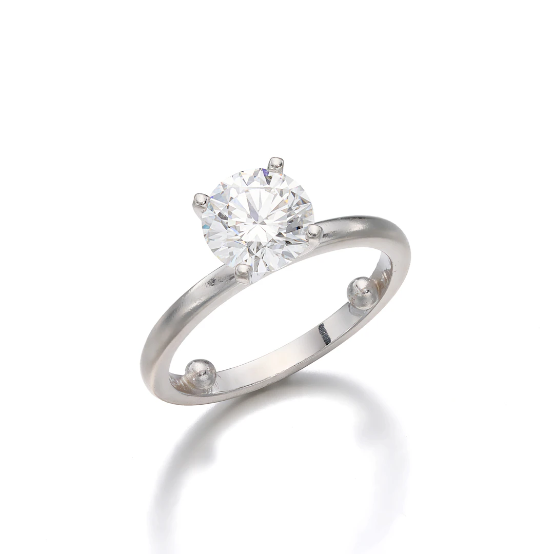 A Diamond Solitaire and Platinum Ring