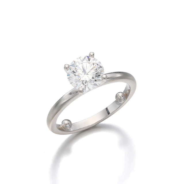 A Diamond Solitaire and Platinum Ring